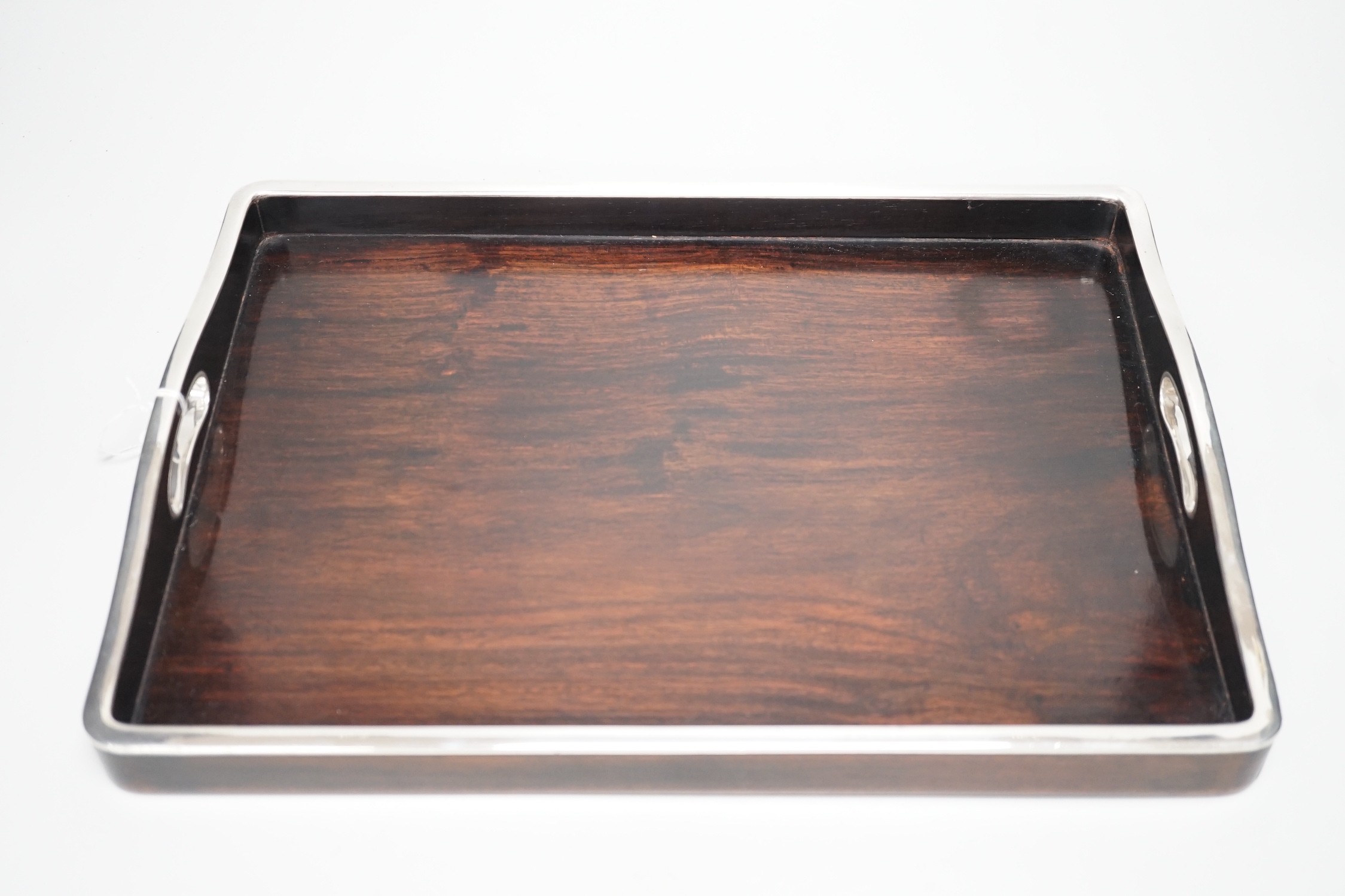 A 1920s Chinese hongmu and white metal mounted tray. 38cm wide